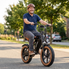 A man riding a Happyrun Tank G60 UL 2849 Certified Electric Dirt Bike on urban area