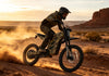 HappyRun G300 Pro electric dirt bike with hydraulic disc brakes braking on desert terrain